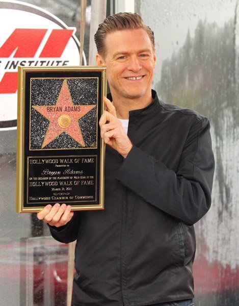 Брайан Адамс