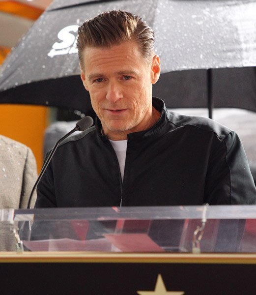 Брайан Адамс