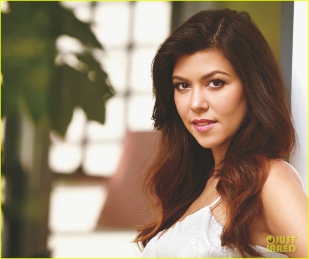 kourtney-kardashian-cradles-baby-bump-fit-pregnancy-cover-02