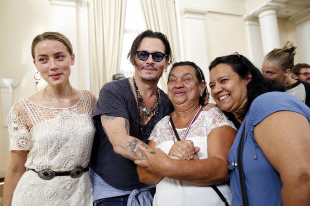 RIO DE JANEIRO, BRAZIL - SEPTEMBER 24: Johnny Depp and Amber Heard from The Hollywood Vampires attend the Starkey Hearing Foundation event to support and benefit people in need at Belmond Copacabana Palace on September 24, 2015 in Rio de Janeiro, Brazil. (Photo by Vivian Fernandez/Getty Images for Starkey Hearing Foundation) 