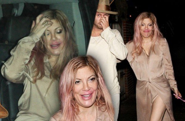 tori-spelling-falling-down-wet-spot-skirt-mystery-man-pp