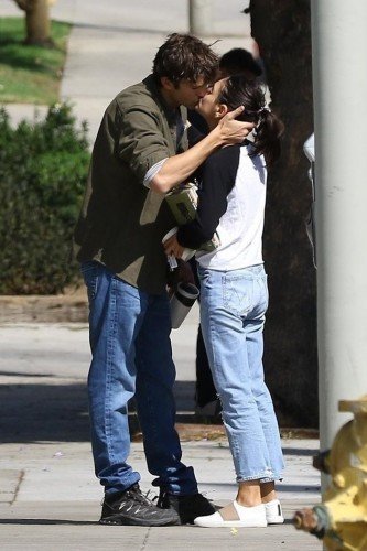 *EXCLUSIVE* So in Love! Ashton Kutcher and Mila Kunis share a passionate kiss before parting ways
