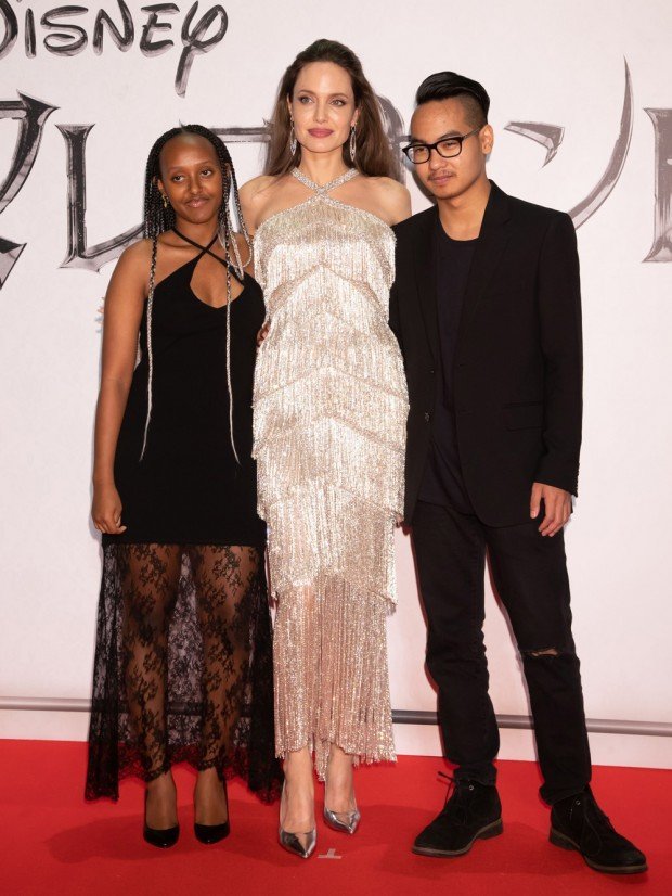 Mandatory Credit: Photo by Masatoshi Okauchi/Shutterstock (10435090r) Zahara Jolie-Pitt, Angelina Jolie and Maddox Jolie-Pitt 'Maleficent: Mistress of Evil' film premiere, Roppongi Hills Arena, Tokyo, Japan - 03 Oct 2019 Wearing Ralph & Russo Same Outfit as catwalk model *10325132c