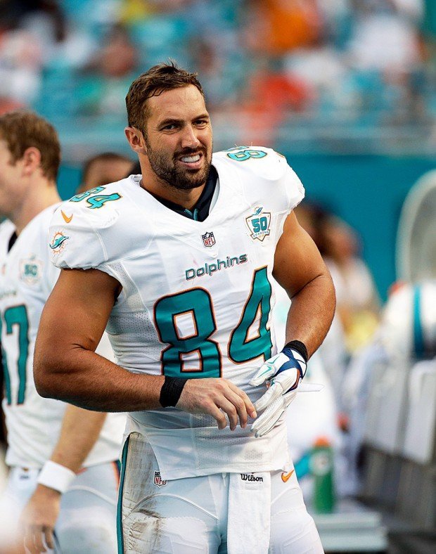 Mandatory Credit: Photo by Wilfredo Lee/AP/Shutterstock (6013233aj) Jordan Cameron Miami Dolphins tight end Jordan Cameron (84) walks the sidelines during the second half of an NFL football game against the Buffalo Bills, in Miami Gardens, Fla Bills Dolphins Football, Miami Gardens, USA 