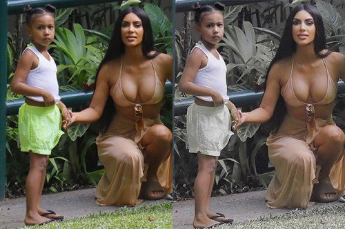 EXCLUSIVE: **Premium Exclusive** Kim Kardashian rides an elephant in Bali, Khloe plays with baby True while Kourtney and Scott have fun with their children